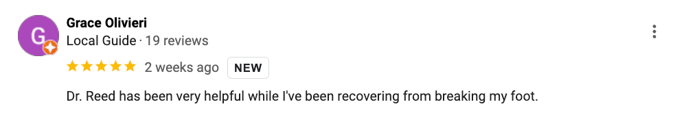 A blurry picture of a google review with a purple circle in the middle.