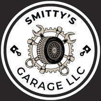 SMITTY’S GARAGE LLC logo with a gear and wrench emblem in black, white, and tan