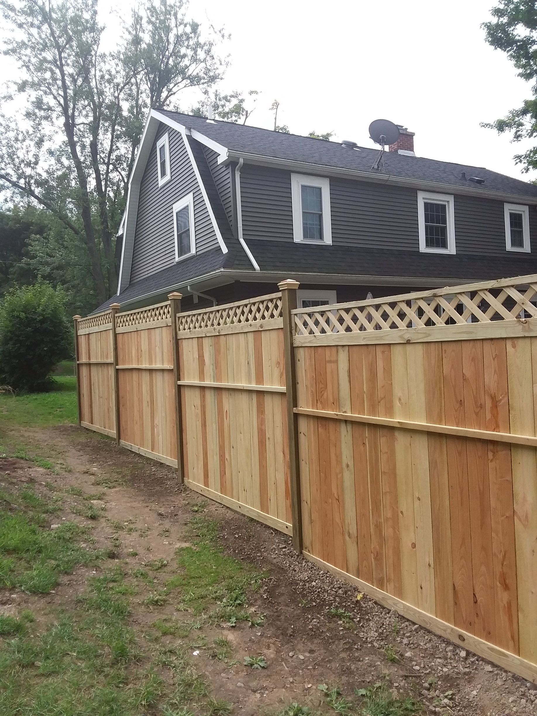 Wood fence installation in Delevan, NY by KKR Fencing