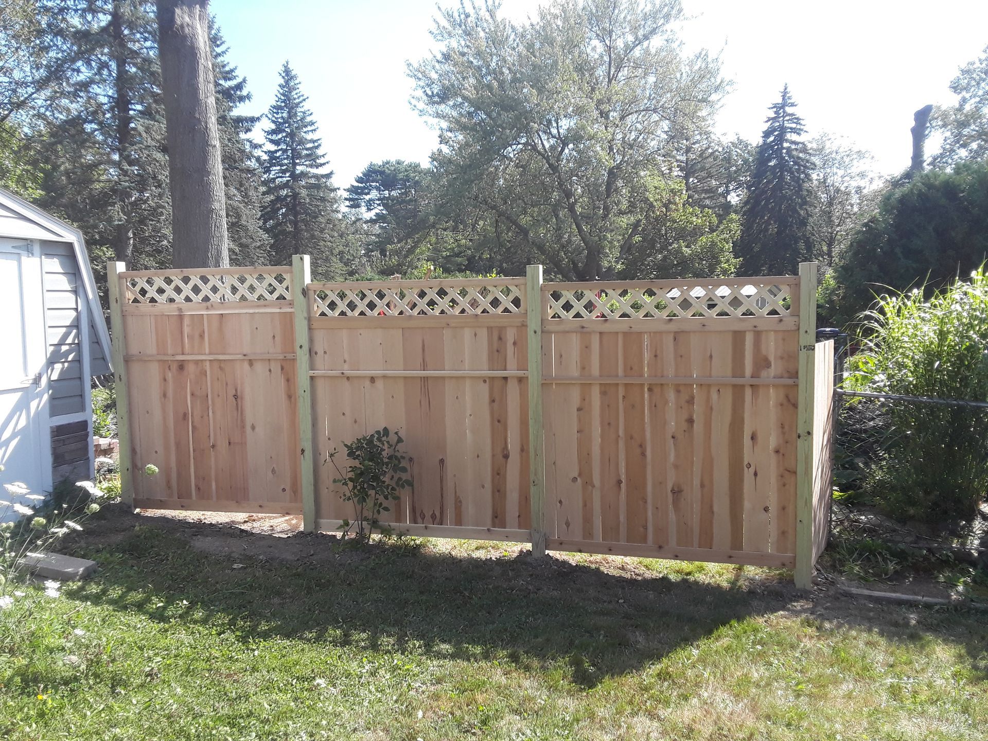 Wood fence installation in Delevan, NY by KKR Fencing