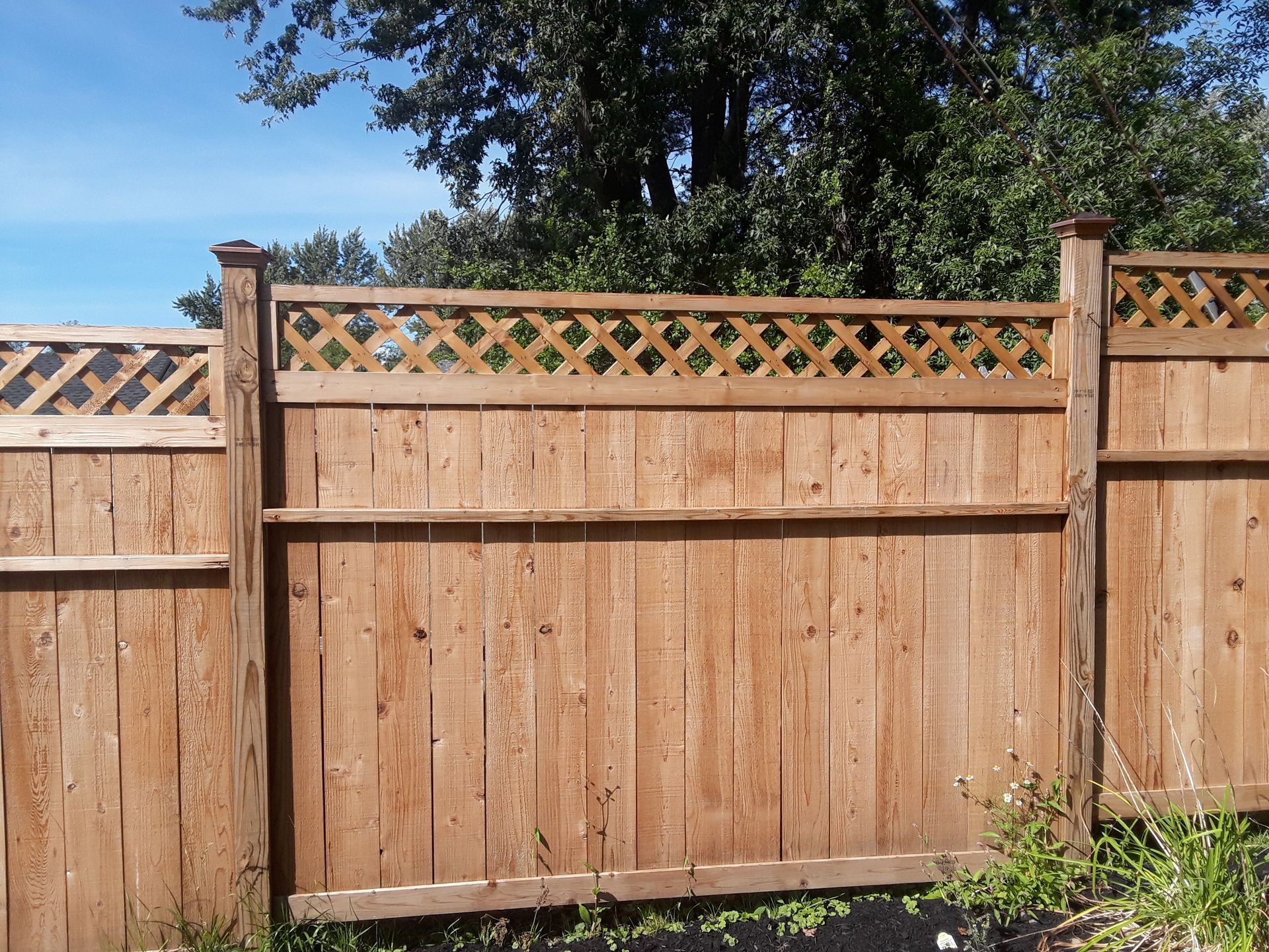 Wood fence installation in Delevan, NY by KKR Fencing