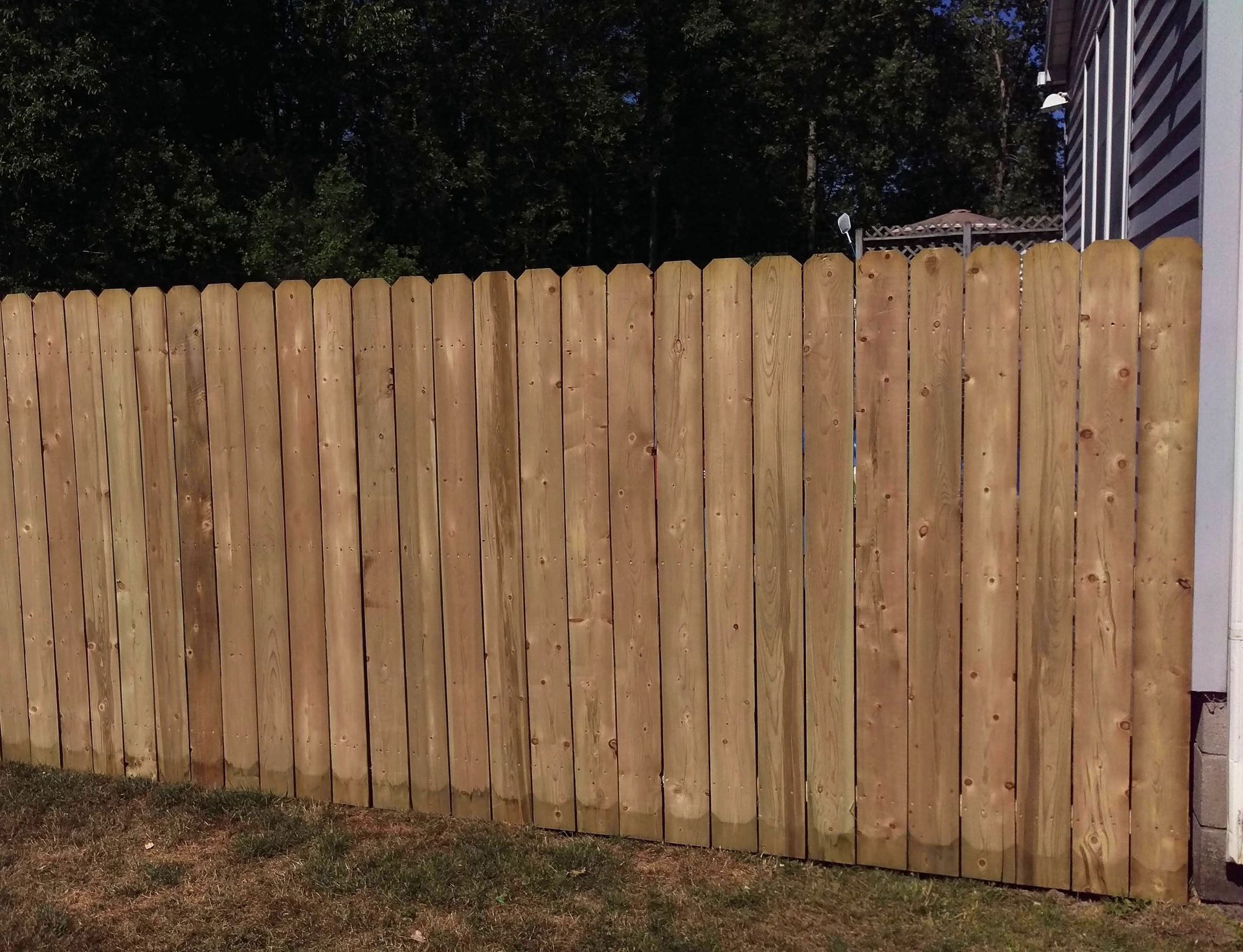 Wood fence installation in Delevan, NY by KKR Fencing