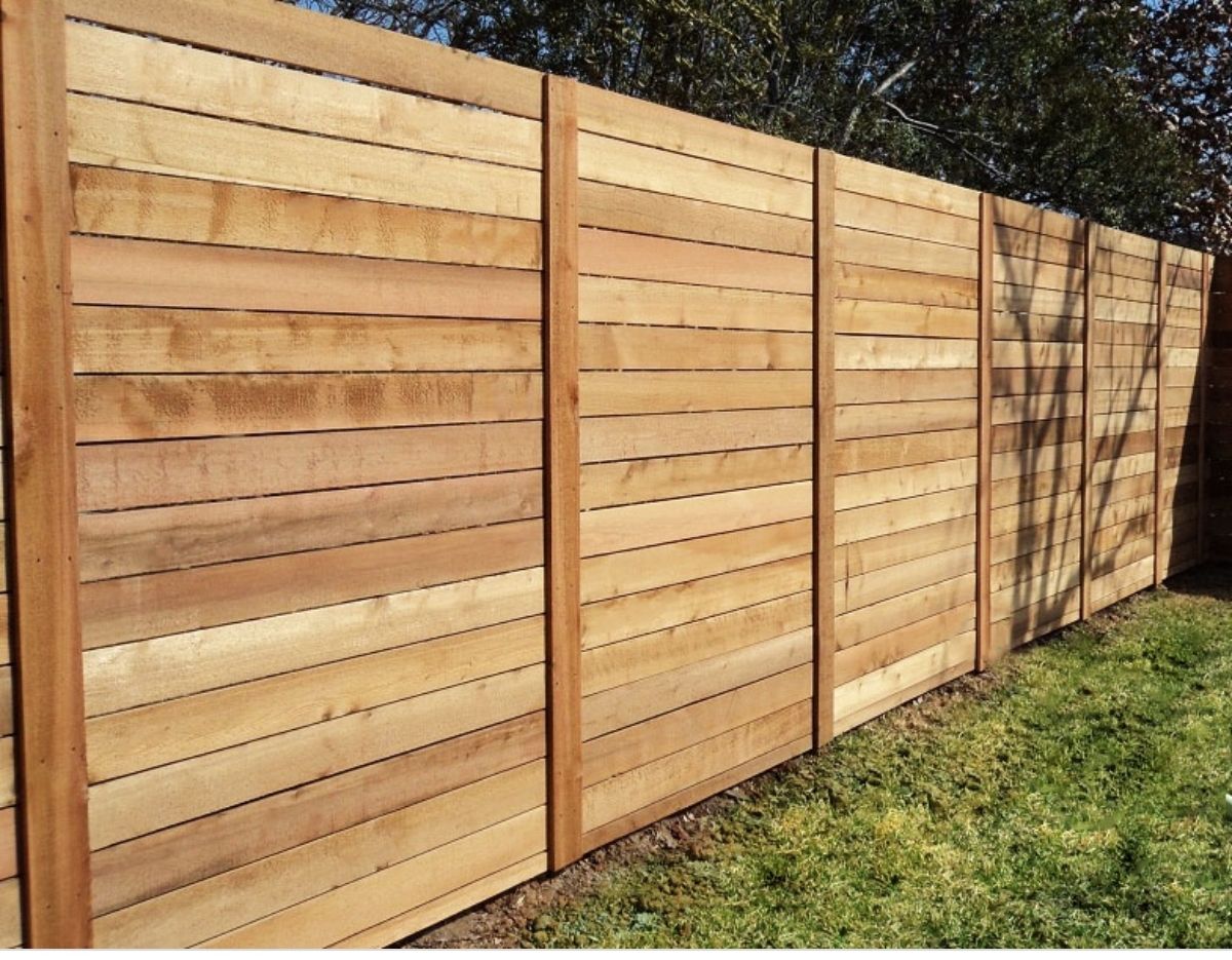 Wood fence installation in Delevan, NY by KKR Fencing
