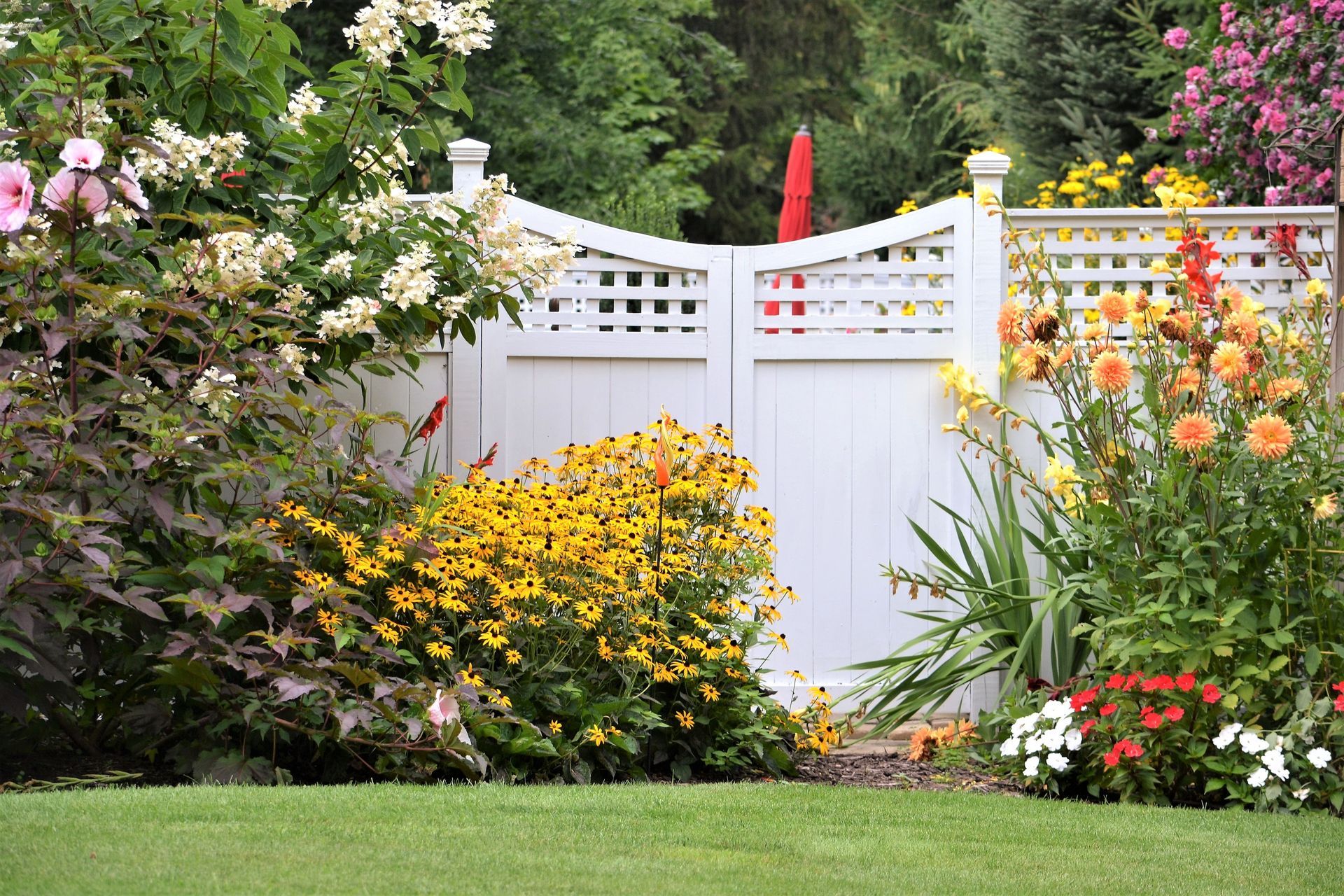 Fence installation near Delavan, NY using wood and vinyl materials