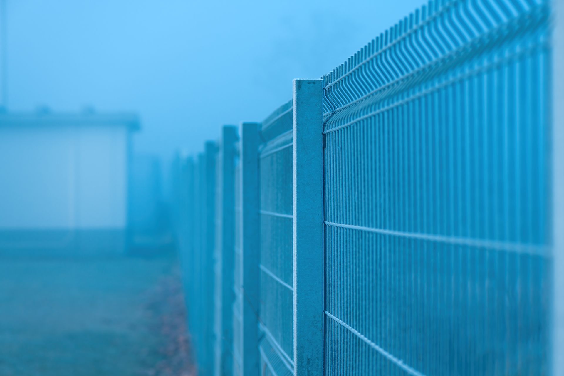 commercial metal fence being shown in the morning