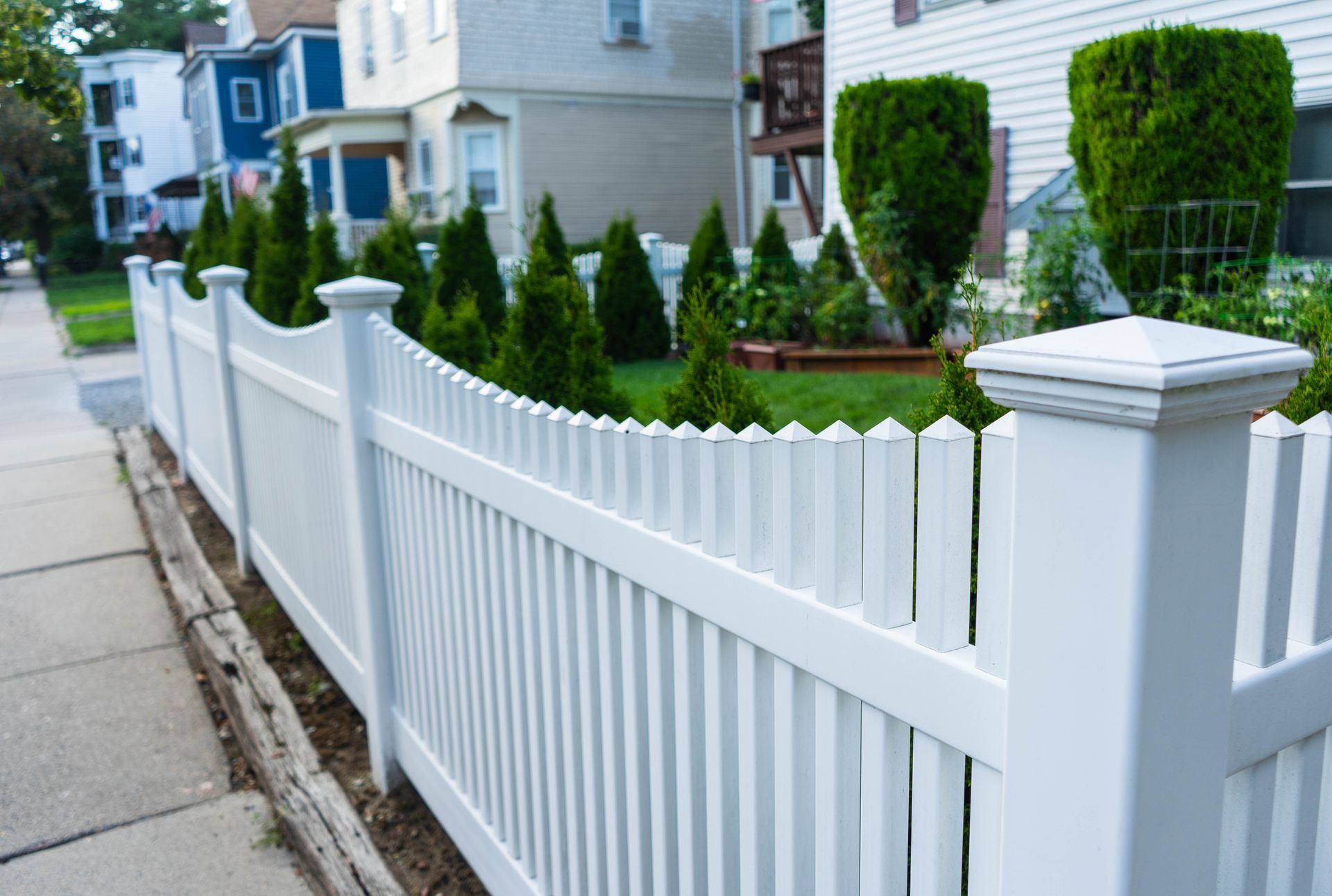 Backyard vinyl fence installation in Amherst, NY