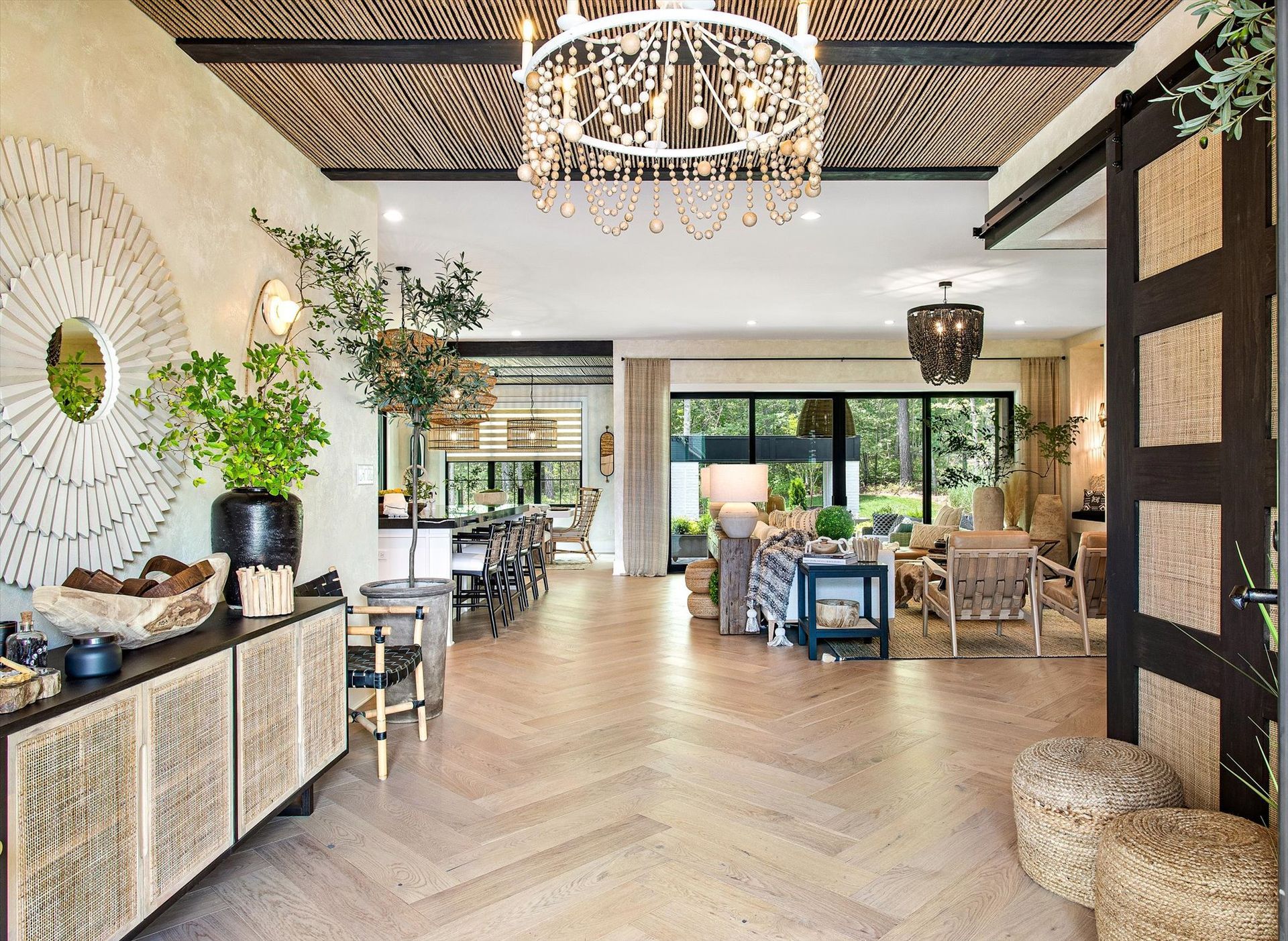 A living room filled with furniture and a chandelier.