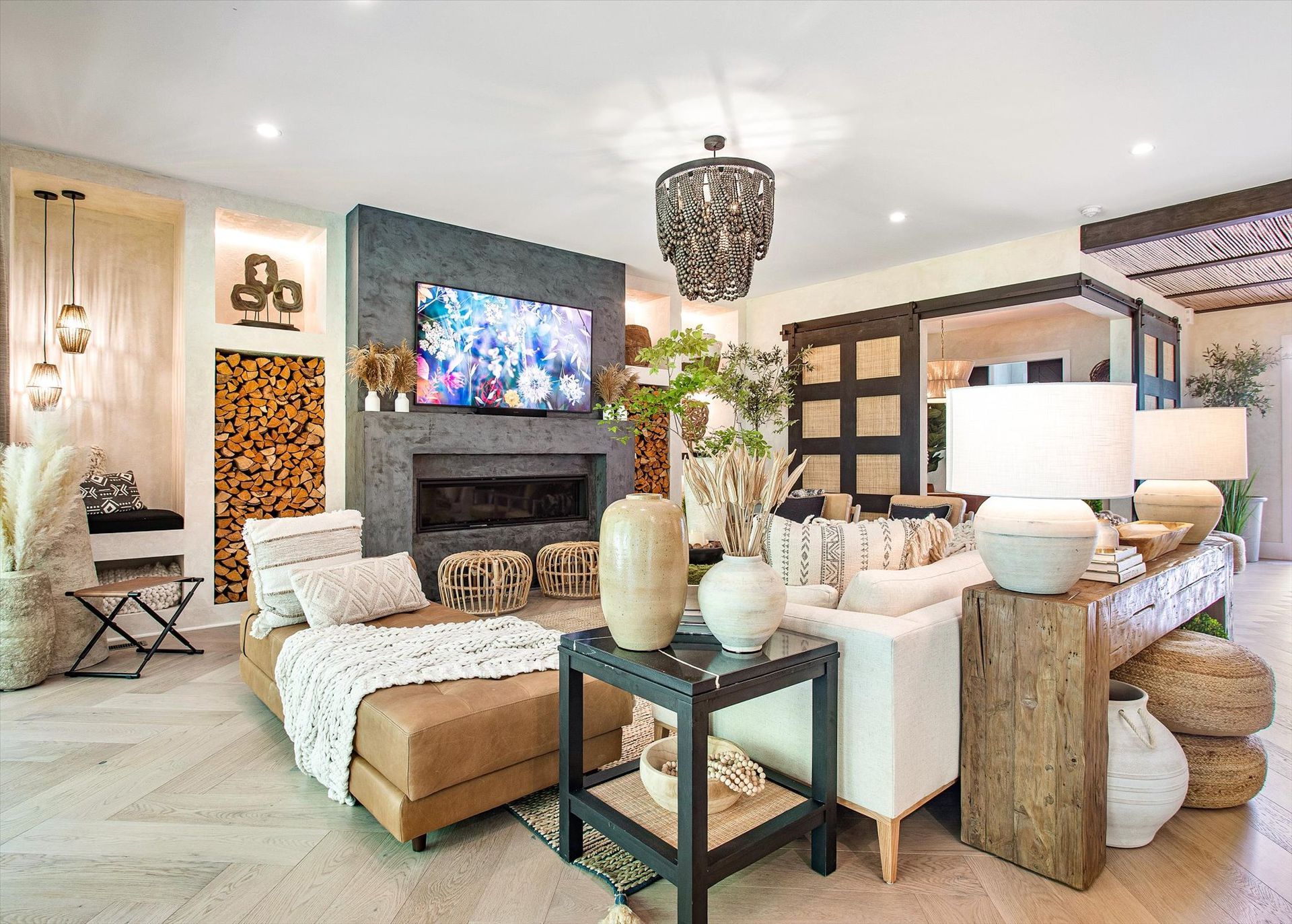 A living room filled with furniture and a television.