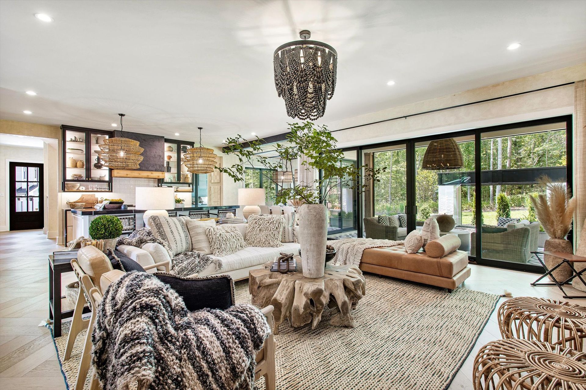 A living room filled with furniture and a chandelier.