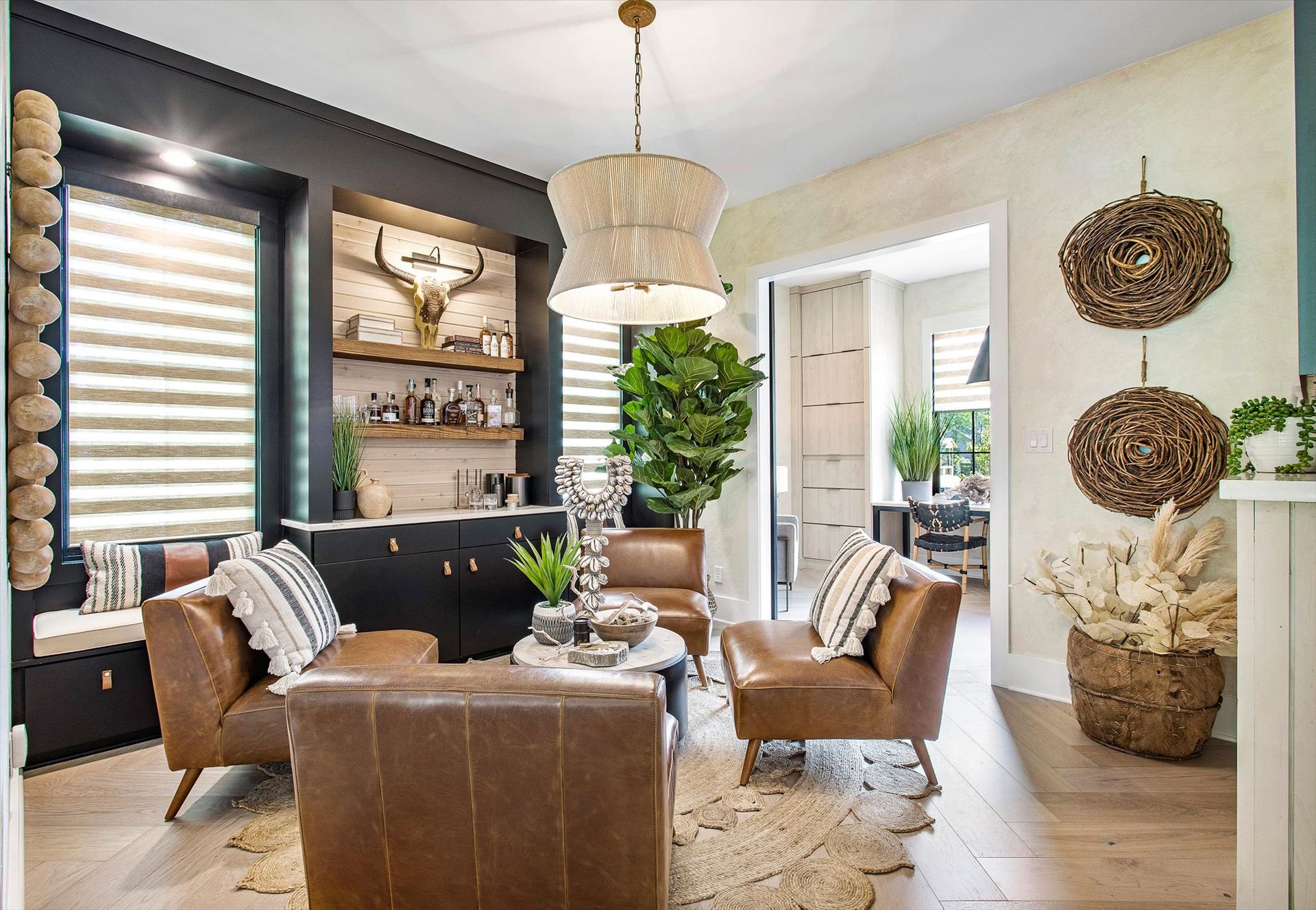 A living room filled with furniture and a chandelier.