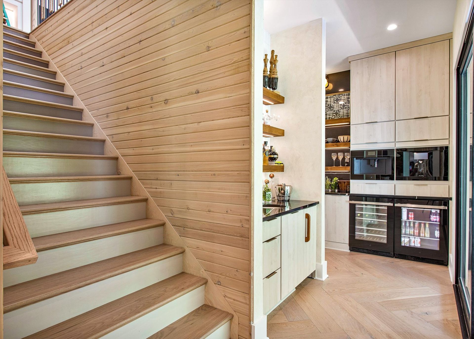 There is a staircase leading up to the second floor of a house.