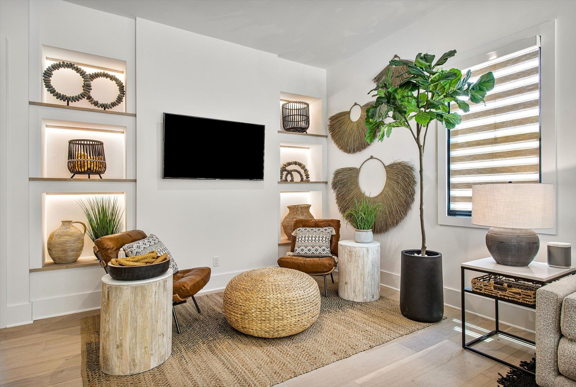 A living room filled with furniture and a flat screen tv.