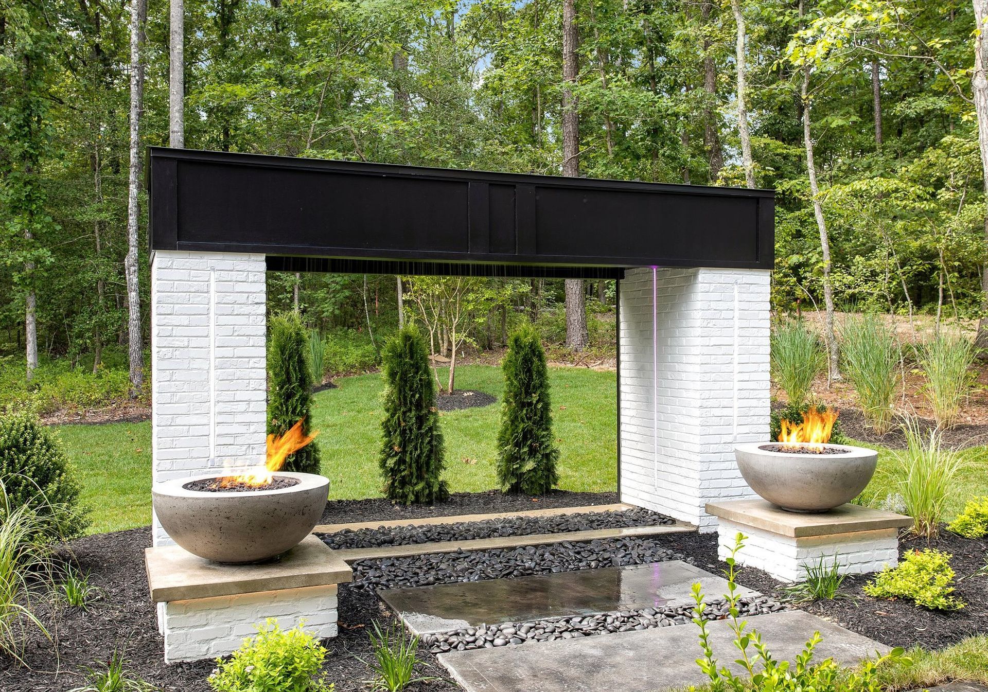 There is a fire pit in the middle of the yard.