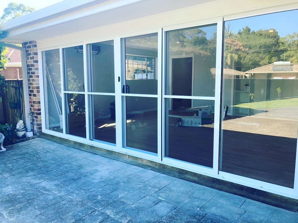 A House with A Lot of Windows — Boambee Gauze 'n' Glass in Harbour, NSW