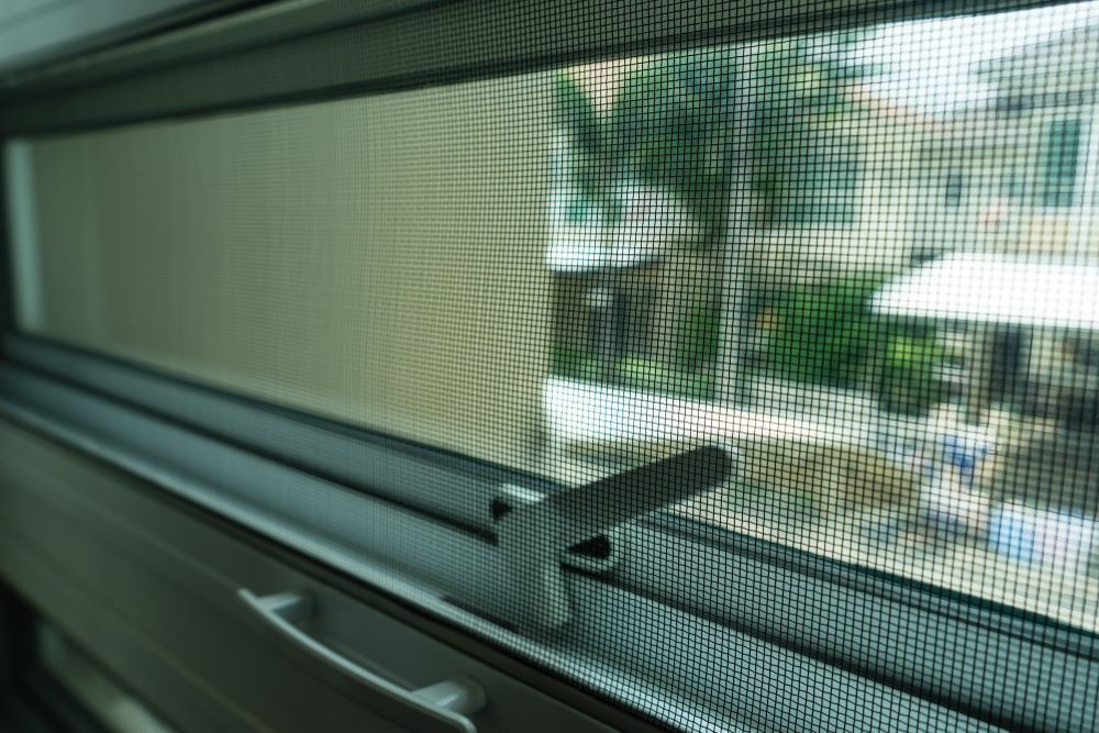 A Close up Of a Window with A Screen on It — Boambee Gauze 'n' Glass in Harbour, NSW