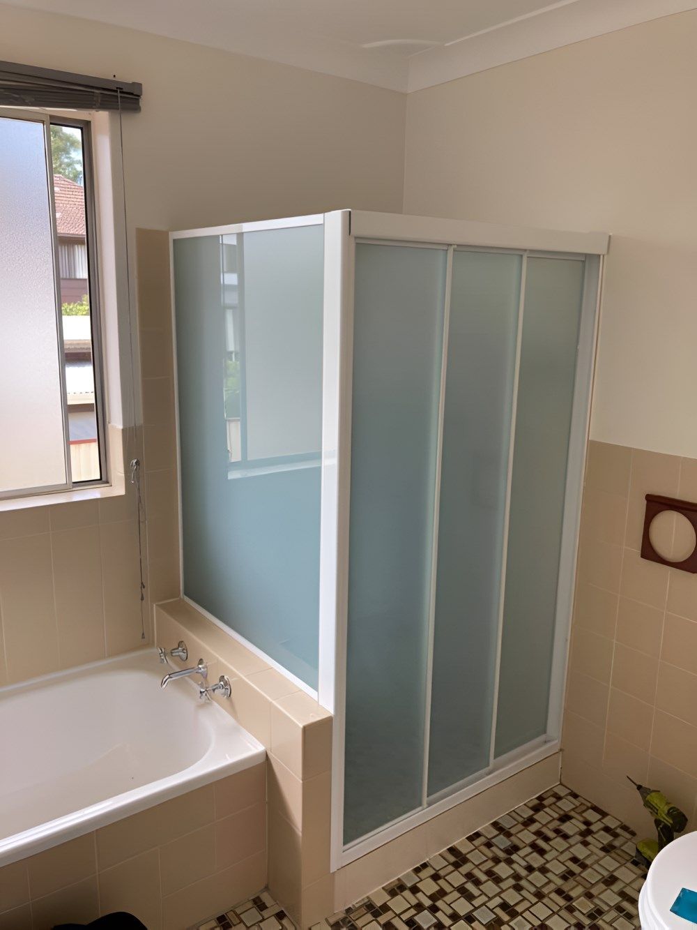 A Bathroom with A Bathtub and A Shower Stall — Boambee Gauze 'n' Glass in Harbour, NSW