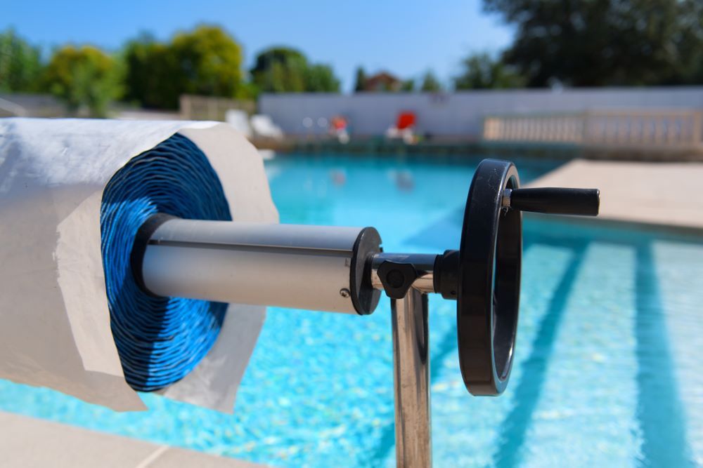 A Roll of Paper Towels is Sitting Next to a Swimming Pool — Figleaf Pool Products in Coconut Grove, NT