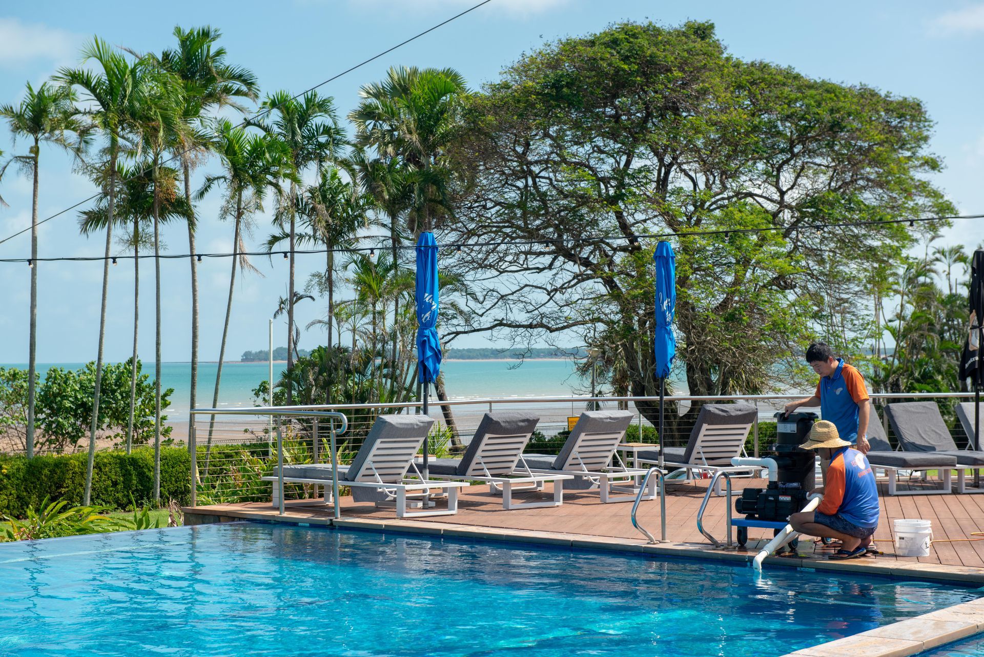Water Testing on a Large Pool In Front of a Building — Figleaf Pool Products in Coconut Grove, NT