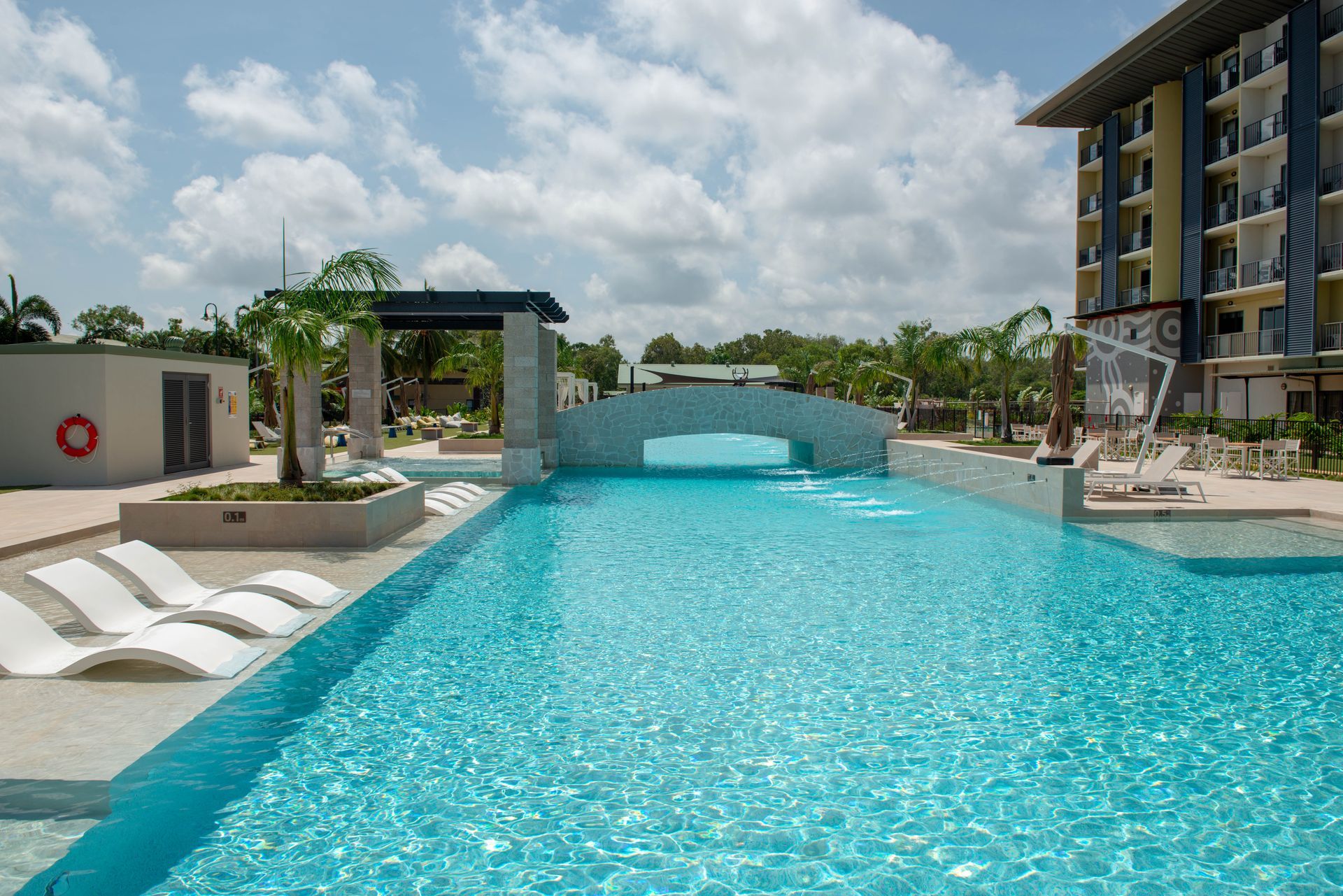 There is a Large Swimming Pool in Front of a Building — Figleaf Pool Products in Coconut Grove, NT