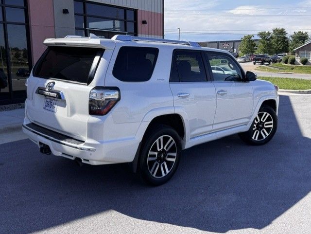 White SUV parked outside a building on a sunny day