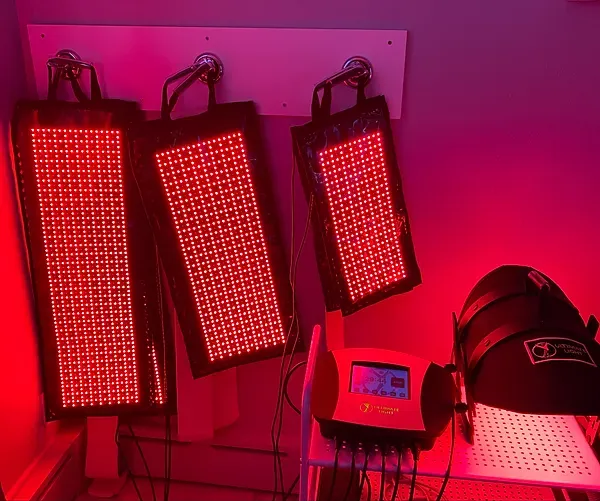 A bunch of red lights are sitting on a table.