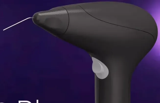 A black hair removal device with a purple background