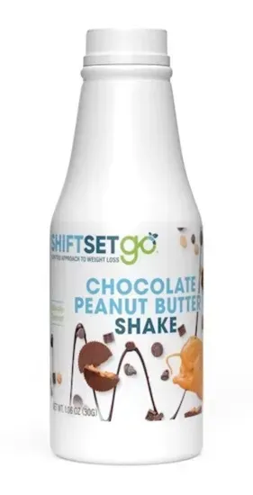 A bottle of chocolate peanut butter shake on a white background