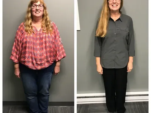 A woman in a plaid shirt and a woman in a gray shirt are standing next to each other.