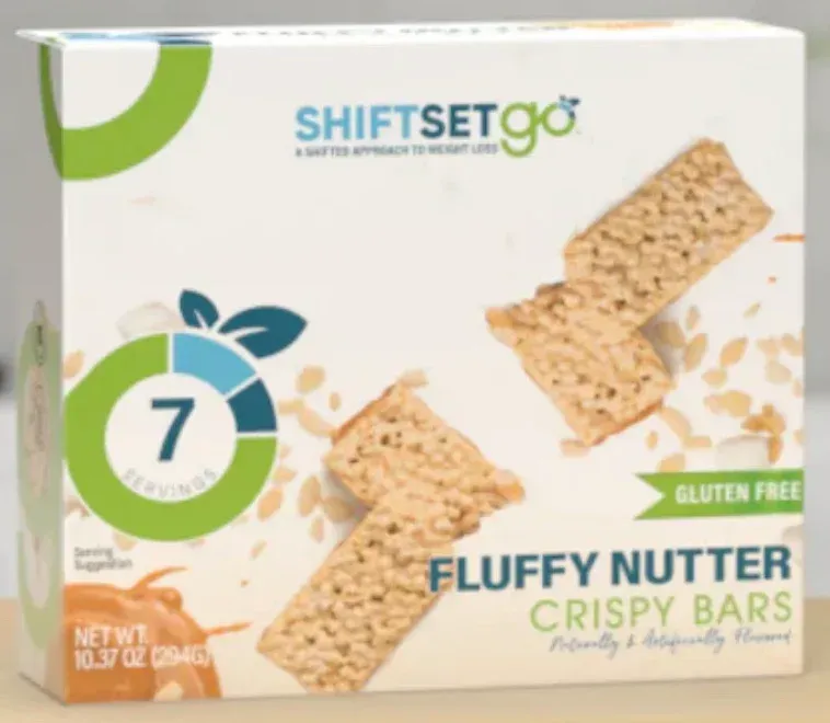 A box of fluffy nutter crispy bars sitting on a table