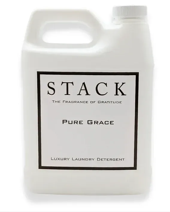 A white bottle of stack pure grace laundry detergent