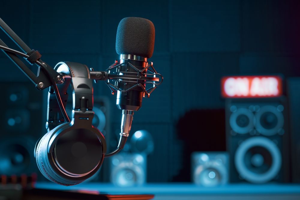Microphone and headphones in a recording studio with an