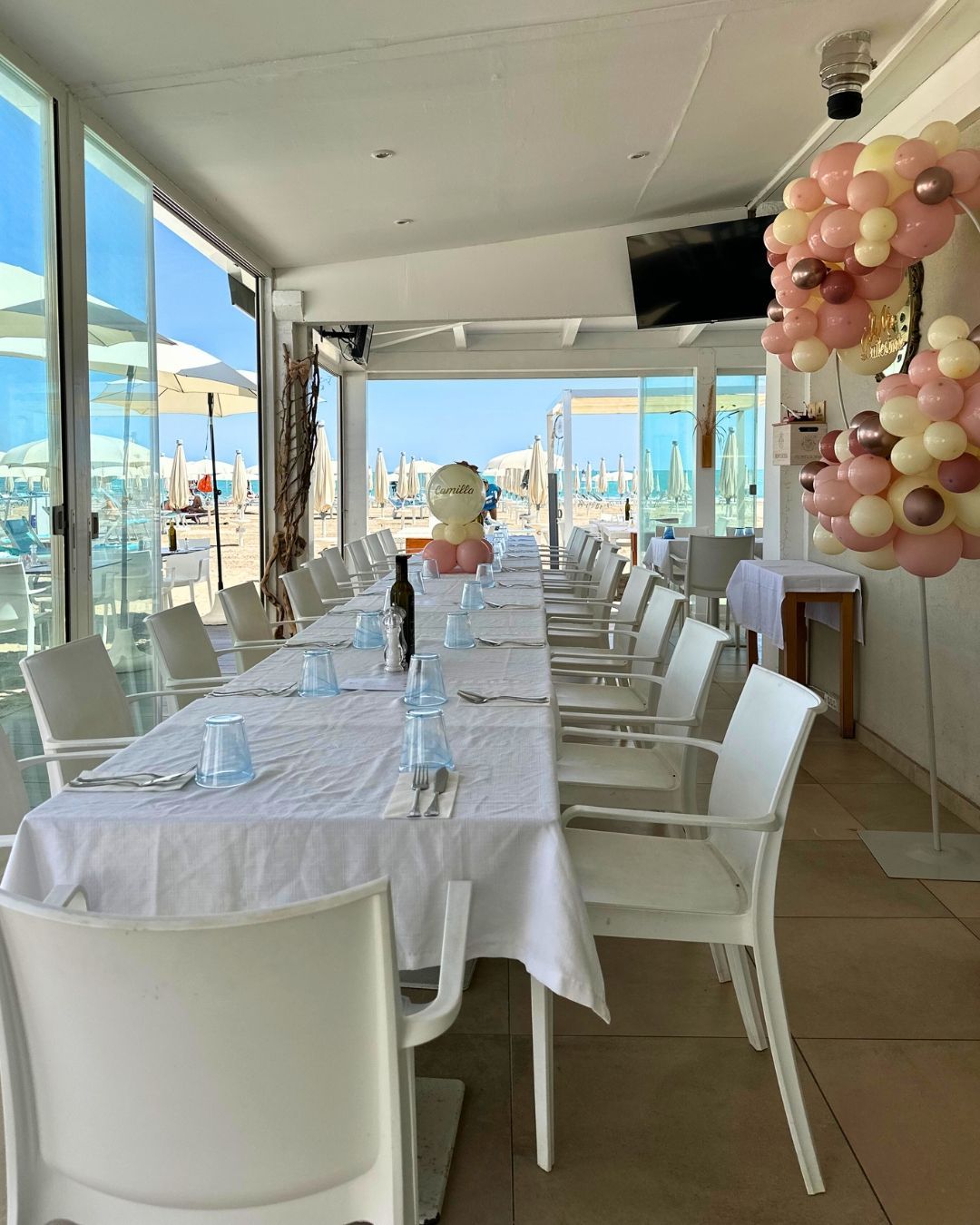 Ristorante per cresima a Riccione - tavolata allestita Vela Blu