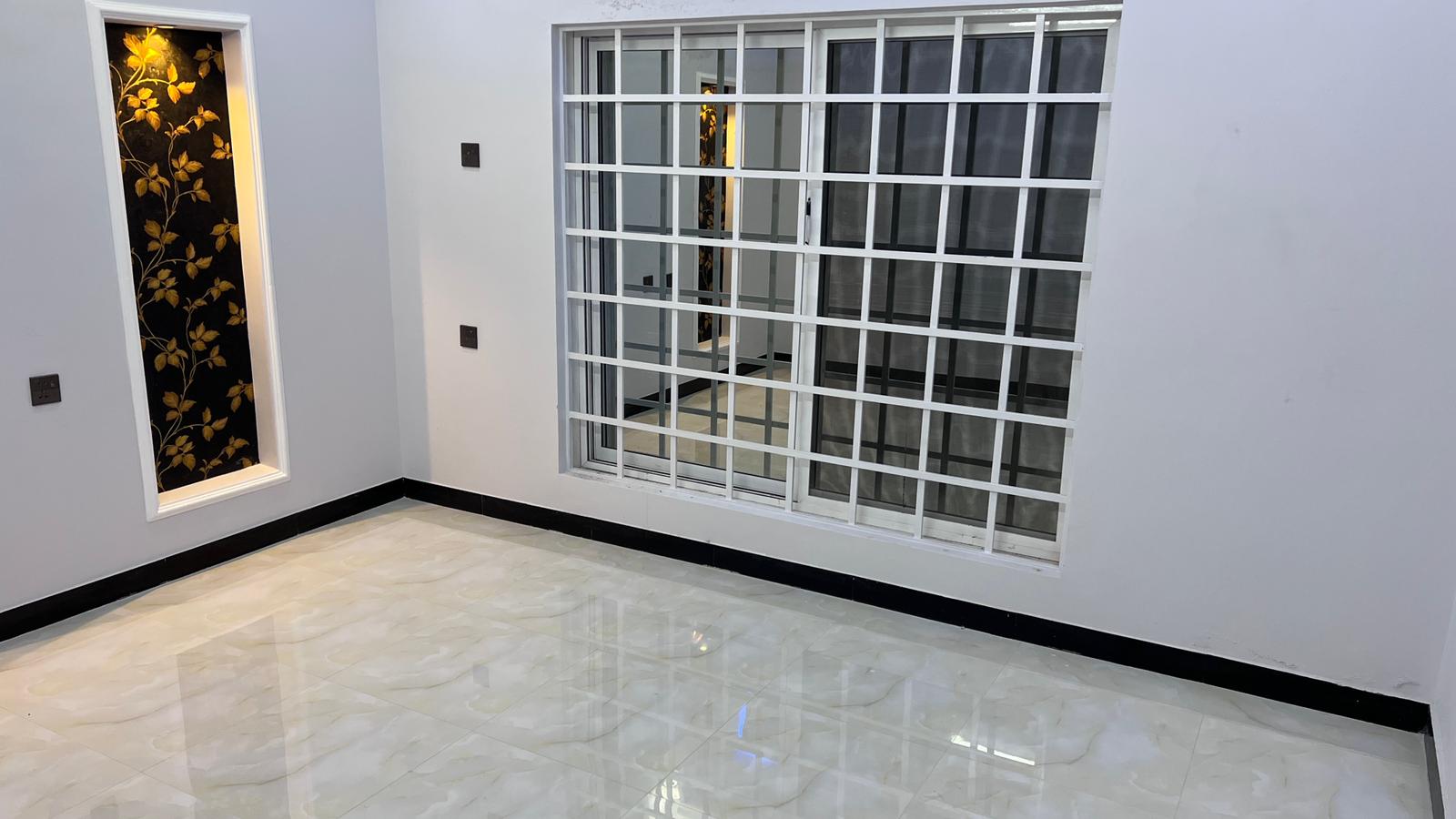There is a large window in the middle of the room.