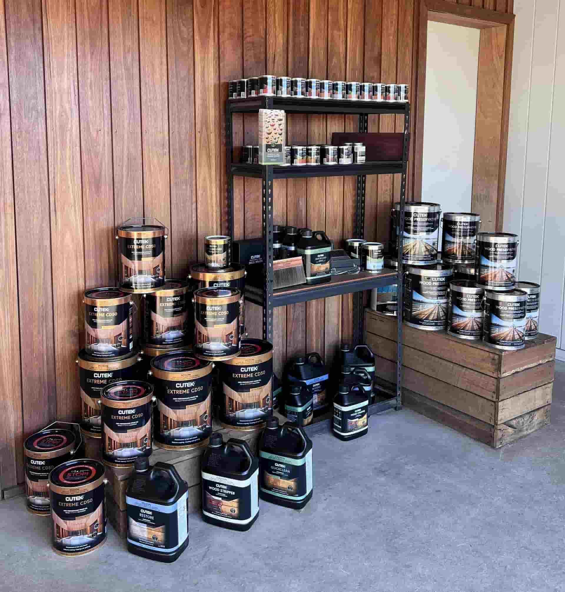 A Room Filled With Lots of Buckets of Paint and a Shelf — B & B Timbers Ballina In West Ballina, NSW