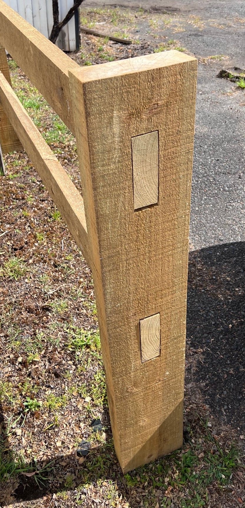 A Close Up of a Wooden Post With a Hole in It — B & B Timbers Ballina In Kingscliff, NSW