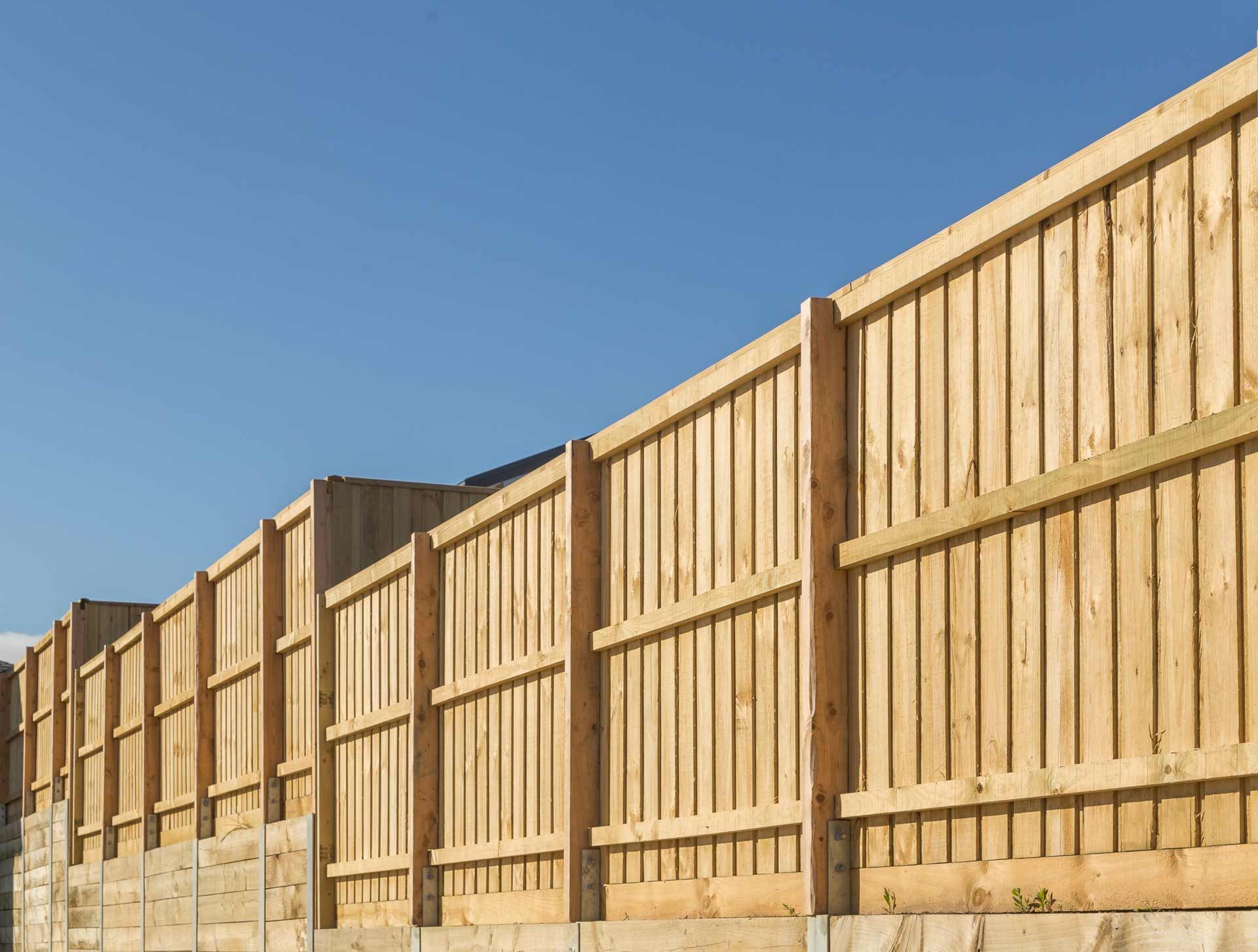 A Row of Wooden Fences Against a Blue Sky — B & B Timbers Ballina In West Ballina, NSW