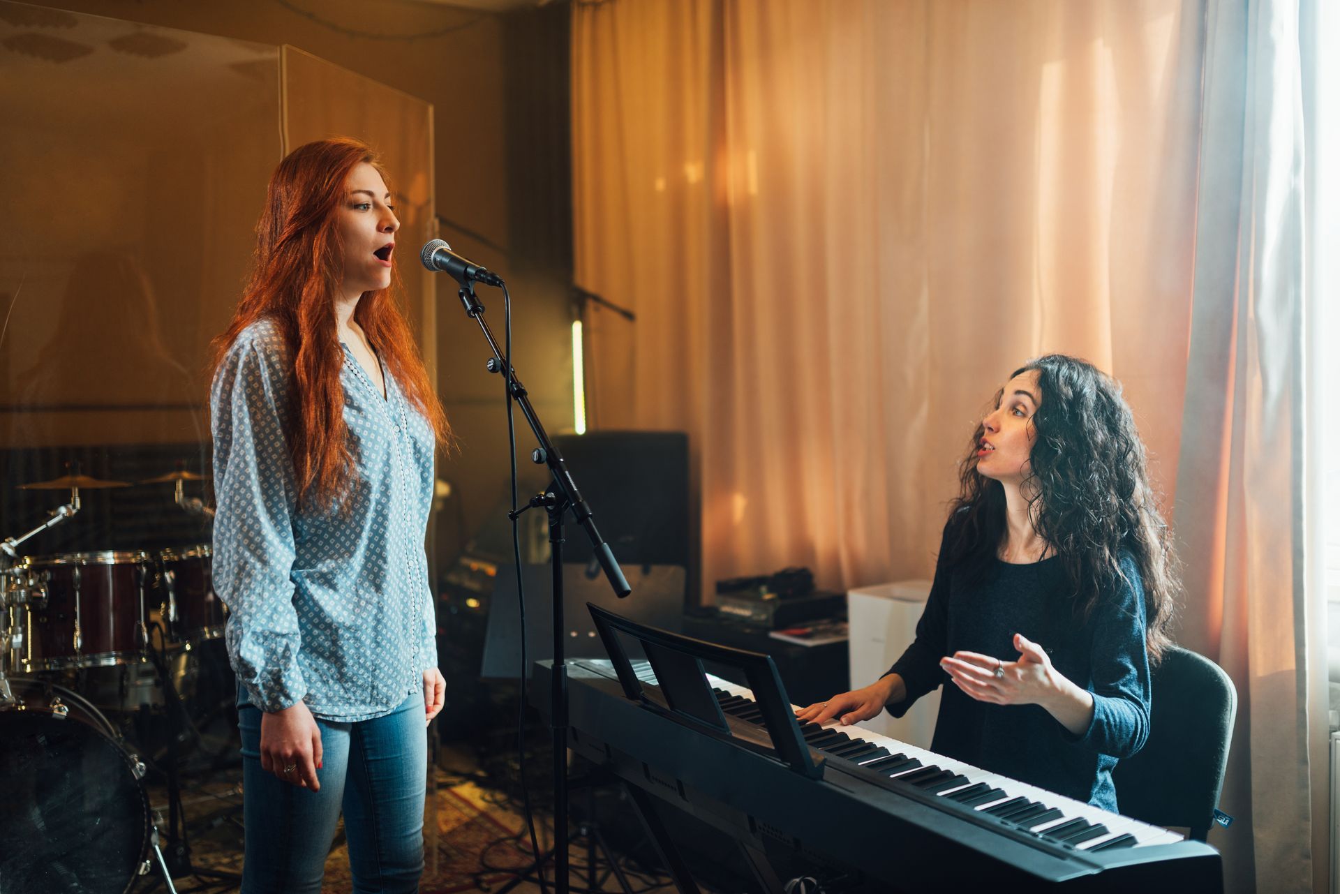 Singer and pianist rehearsing in a warm-lit music studio Singer and pianist rehearsing in a warm-lit music studio
