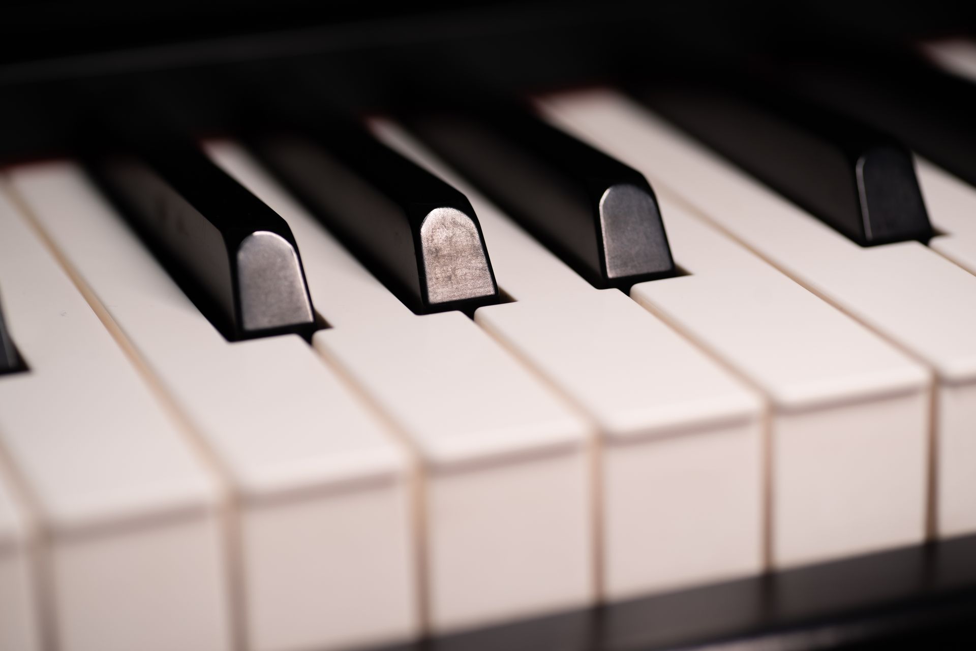 Close-up of black and white piano keys with shallow depth of field Close-up of black and white piano keys with shallow depth of field