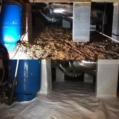 A blue barrel is sitting in a basement next to a vacuum cleaner.