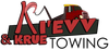 A&V Krue Towing logo with a red tow truck and black-and-red text on a white background
