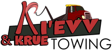 A&V Krue Towing logo with a red tow truck and black-and-red text on a white background