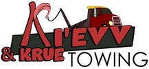A&V Krue Towing logo with a red tow truck and black-and-red text on a white background