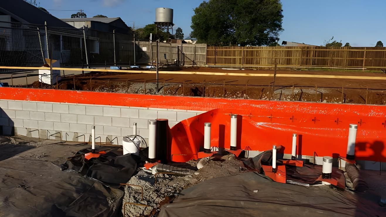 Construction Site With a Termite Barrier on It — Keiran Mortimer Pest Control in Westbrook, QLD