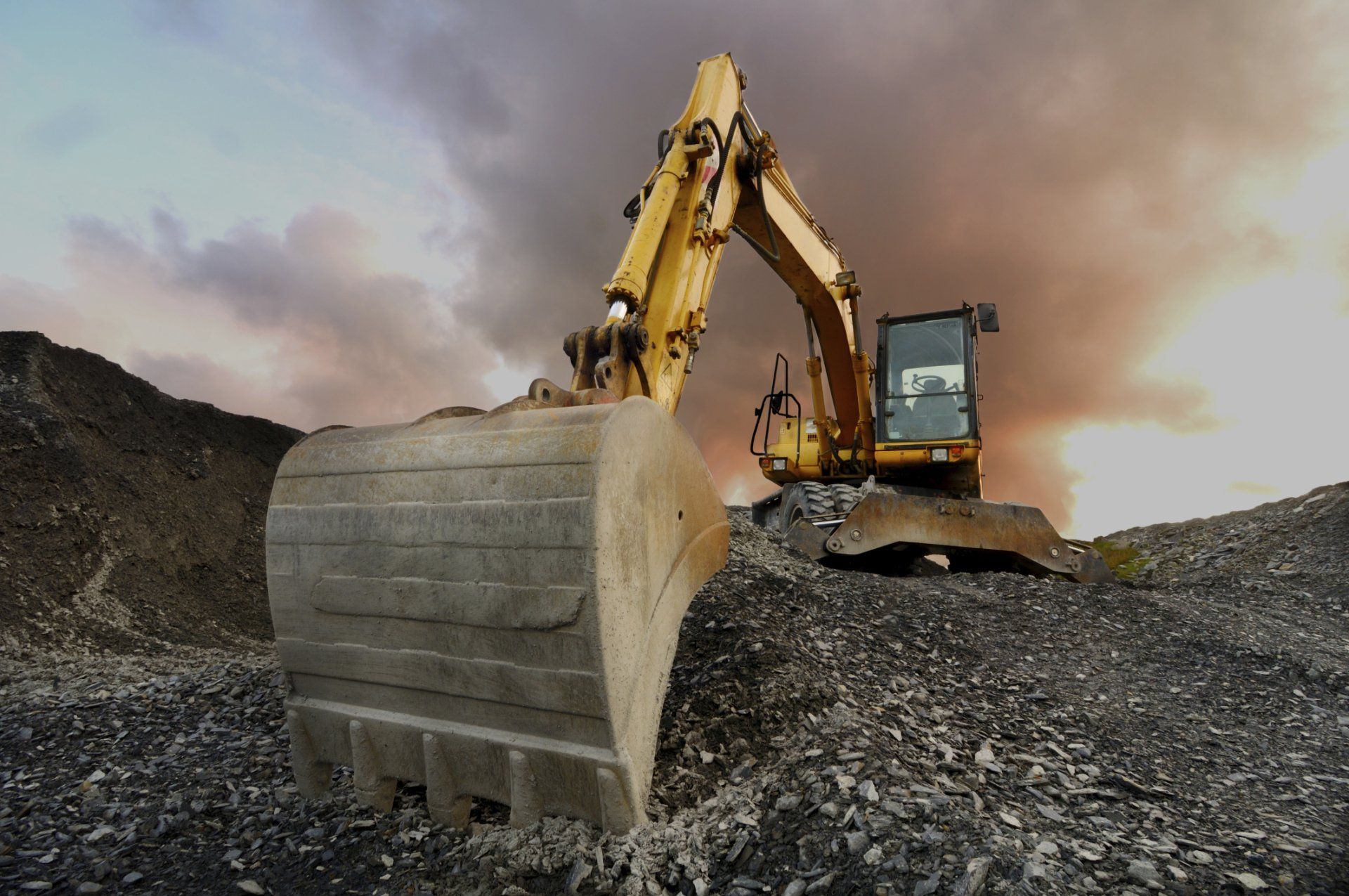 Excavator At Quarry Site — Amsterdam, NY — Santos Construction