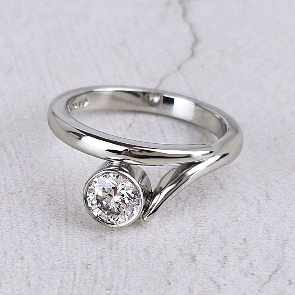 Platinum Flick engagement ring with round diamond Platinum Flick Engagement Ring