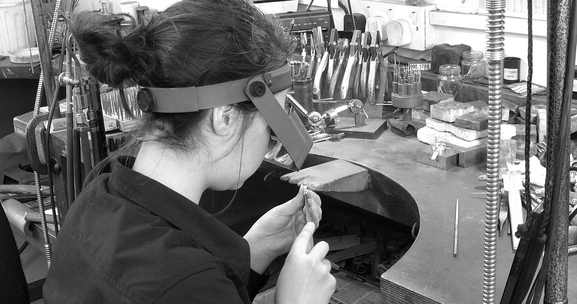 A skilled jewellery artisan at work