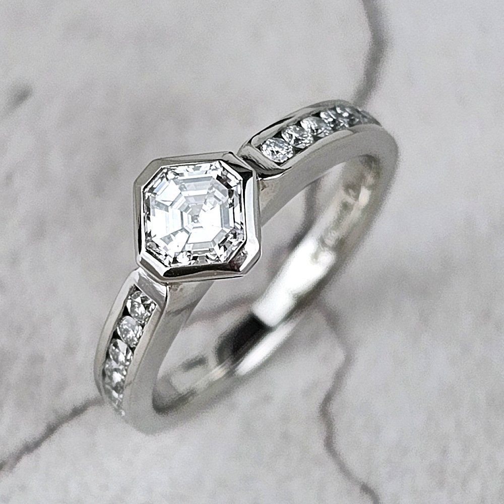 An Asscher-cut diamond engagement ring A diamond engagement ring designed by a customer