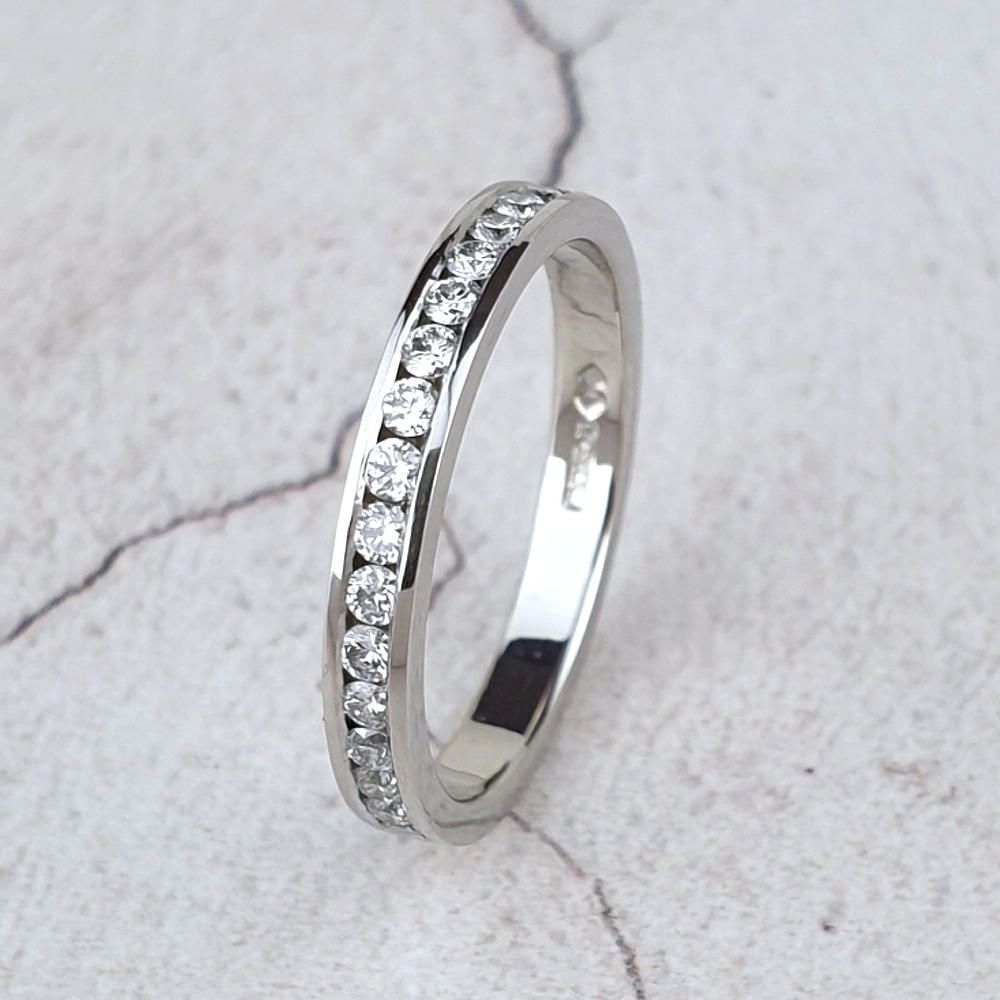 platinum wedding ring with channel-set diamonds