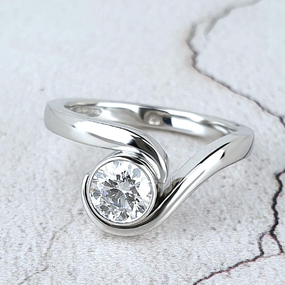 Infinity engagement ring with a marquise diamond Infinity engagement ring with a marquise diamond