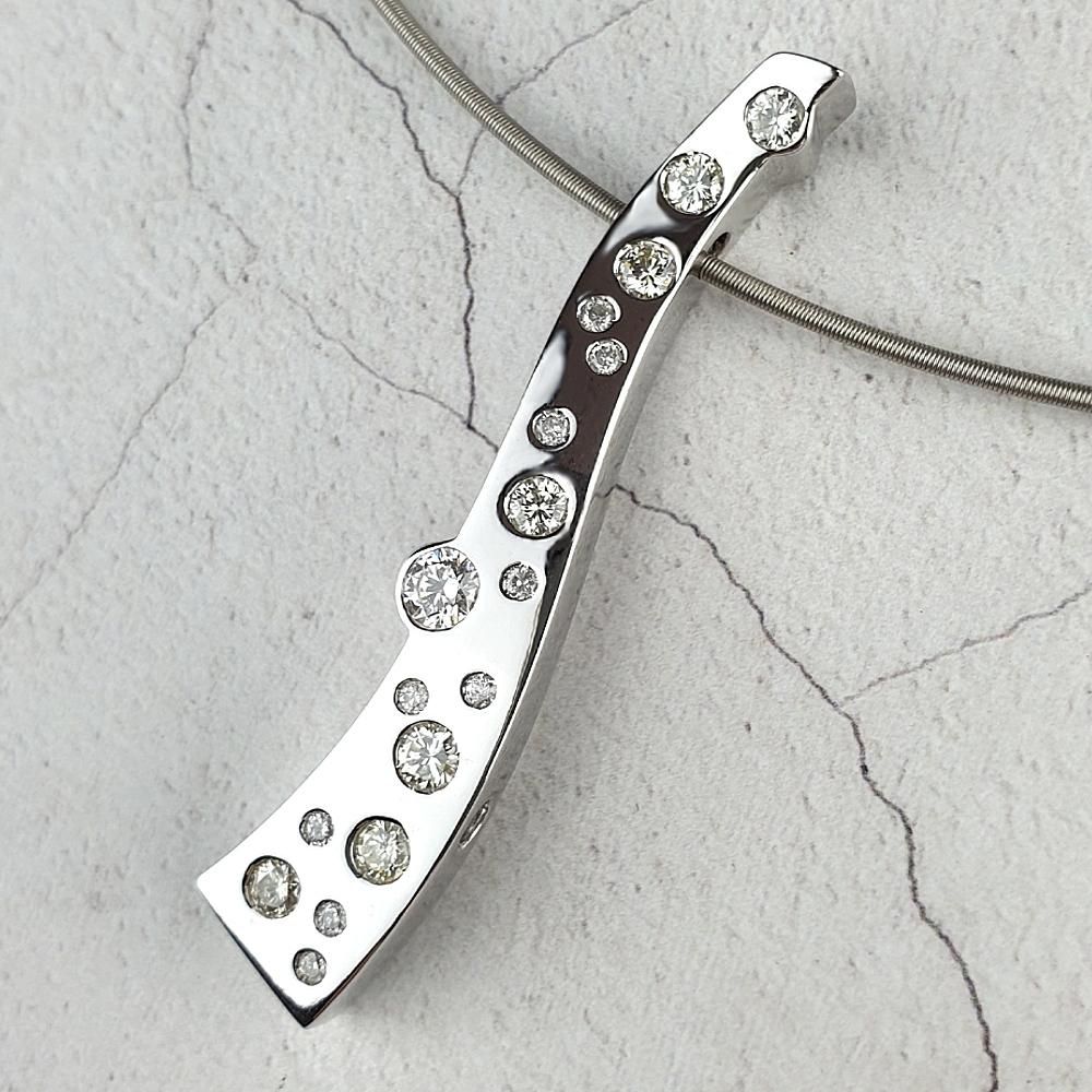 Bespoke diamond pendant A reversible pendant with scattered diamonds